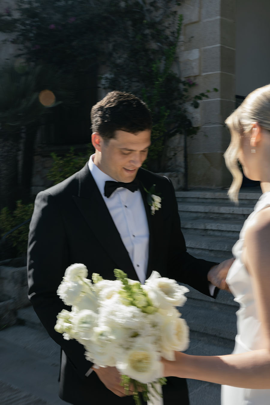 Bride and groom's first look at a black tie wedding at Xalet del Nin